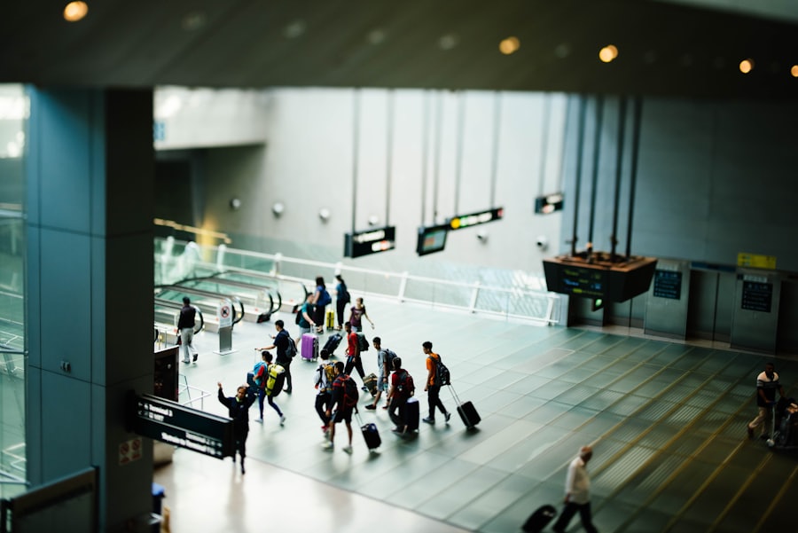 Travelers walking through an airport arrivals hall